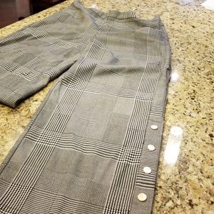 These adorable pants have snaps for an open leg.